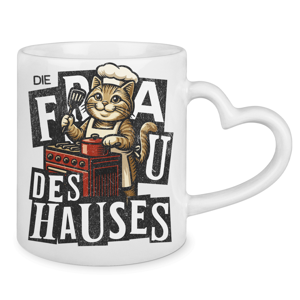 Tasse mit Herzhenkel Die Frau des Hauses - Katze am Kochen